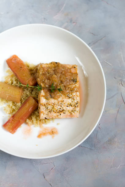 istock Grilled salmon with quinoa and rhubarb sauce. 676530848