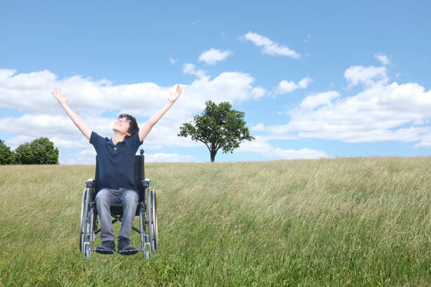 Wheelchair silhouette with yellow background