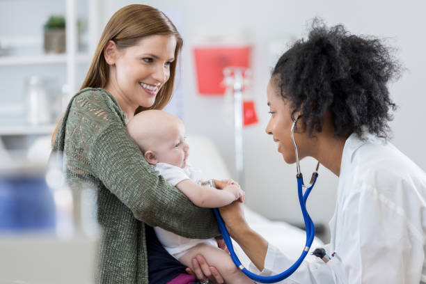 istock Pediatrician listens to baby's lungs 676570560