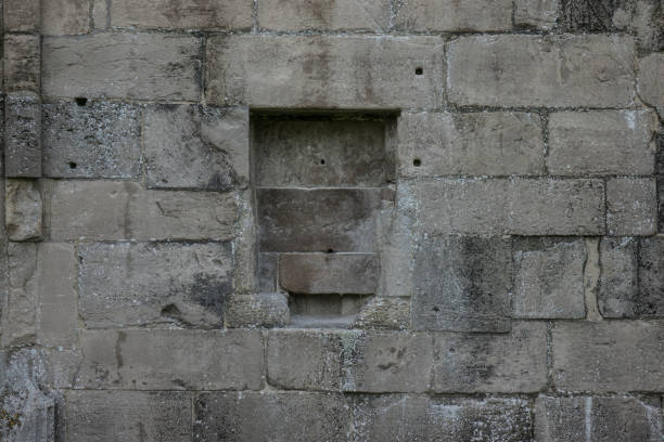istock The old and ancient stone wall of a building 676586010