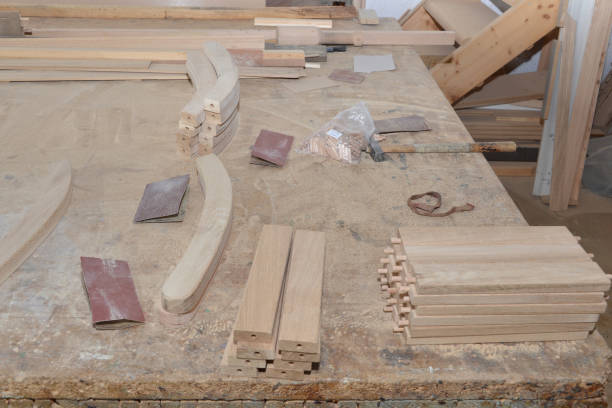 istock Carpentry workshop table and billets of wood for chair. 676593678