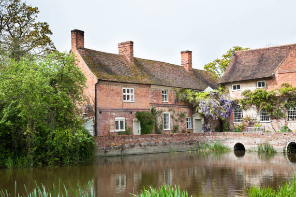 chilly springtime sun on famous beauty spot and tourist destination on River Stour in Essex England Famous as 'Constable Country', as painted by John Constable essex stock pictures, royalty-free photos & images