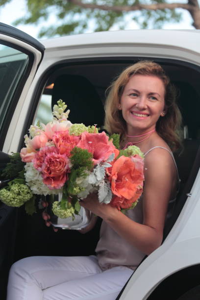 istock Woman with a bouquet. 676659074