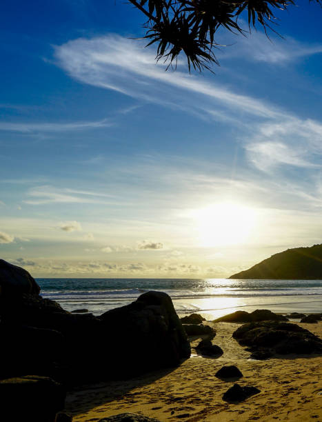 istock Golden Sunset, Blue Sky, Thin Clouds, Nai Harn Beach, Rawai, Phuket Thailand 676694574