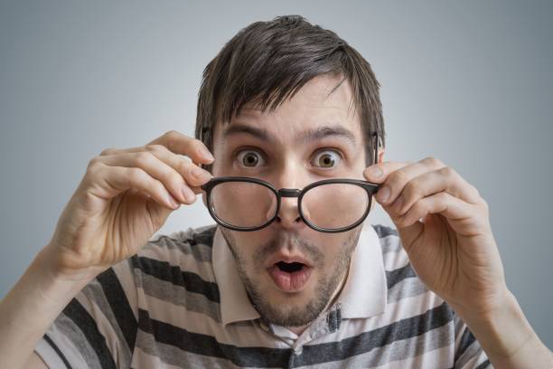 istock Funny man has open mouth and is surprised and shocked. 676702940