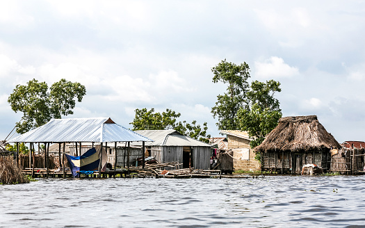 Famous village in Benin lying in Lake Nokoue near Cotonou with a population of more than 20000 people. Pirogue is the main transport to go around in the wet streets of the village.