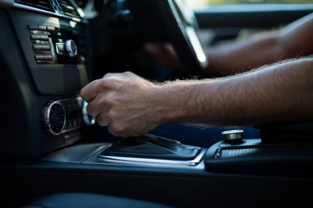 istock Close up of man driving car 676770276
