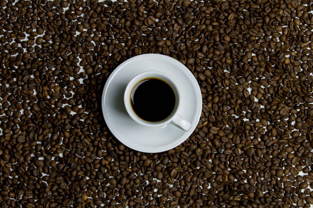 istock Cup of coffee with beans 676802840