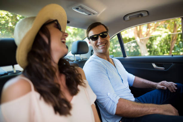 istock Couple traveling in car 676823986