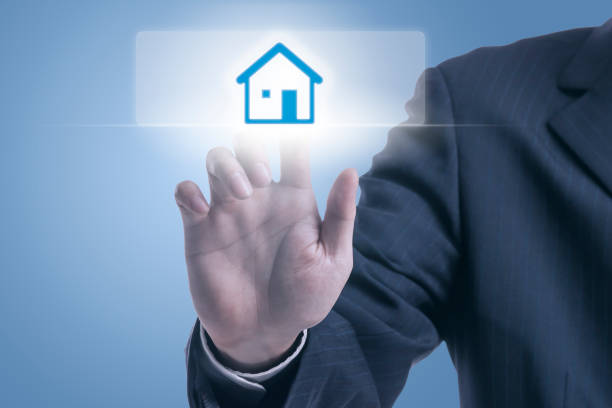 istock Businessman pushing Smart Home icon 676957028