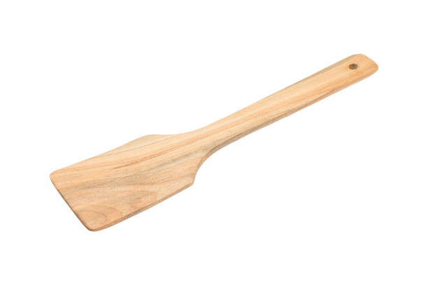 istock Wooden scoop ladle on white background 676967712
