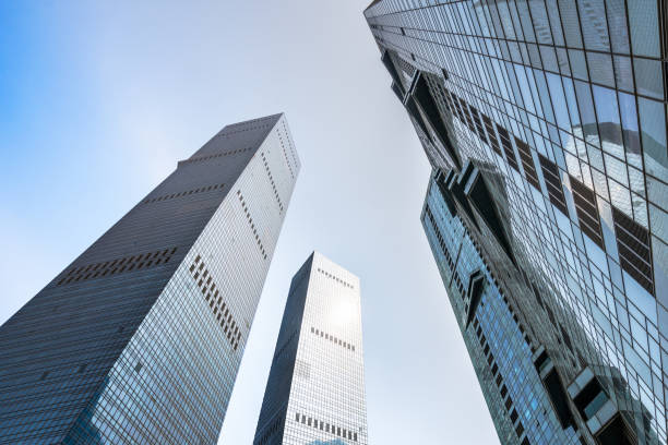 istock low angle view of skyscrapers,business district 677008890