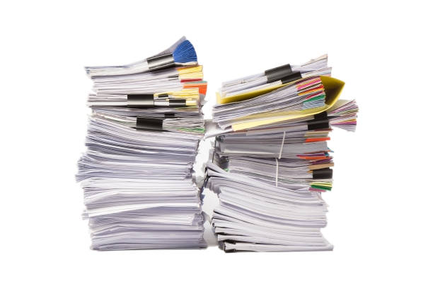 istock Stack of business papers isolated on white background 677025808