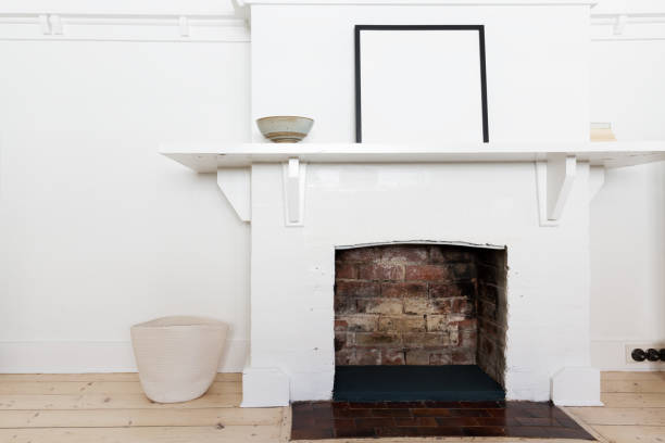 istock White brick fire place in vintage styled living room interior 677068888
