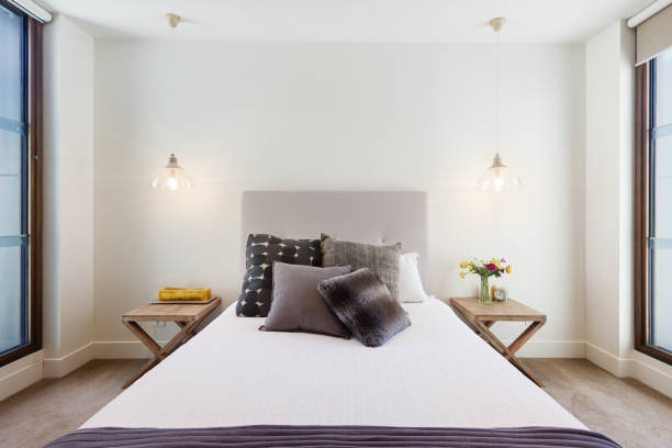 istock Beautiful hamptons style bedroom decor in luxury home interior 677107750