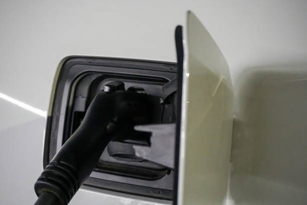 istock Electric Car Charging at Night 677135796