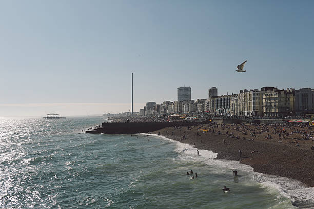 istock High Angle View Of People At Beach Against Sky 677142247