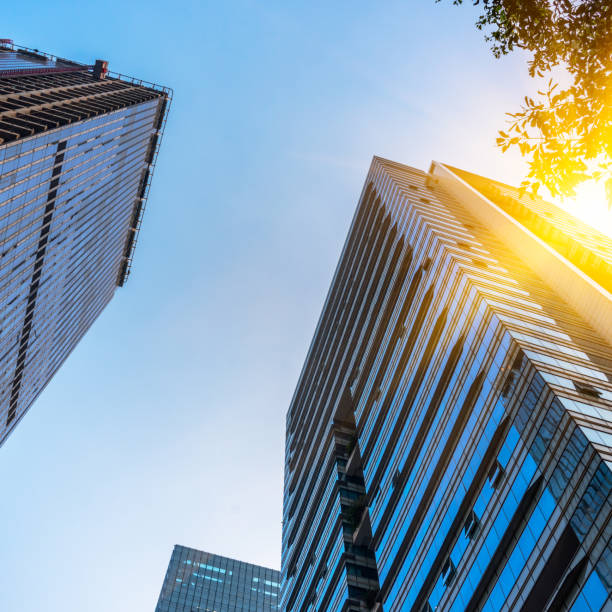 istock low angle view of skyscrapers,business district 677146748