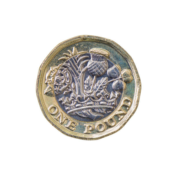 UK 1 Pound Coin A stock photo of the new 2017 UK One Pound coin isolated on a white background. Photographed using the Canon EOS 5DSR. one pound coin stock pictures, royalty-free photos & images