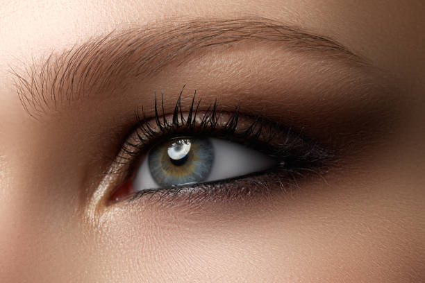 istock Eye makeup. Beautiful eyes make-up. Holiday makeup detail. Long 677158626