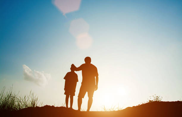 istock Father and son looking for future,  silhouette concept 677161596