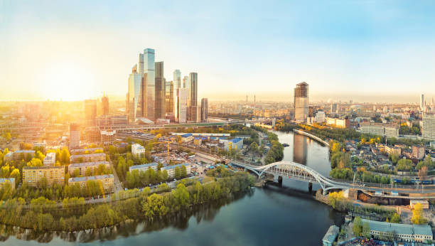 Sunrise over Moscow City, aerial view Sunrise over Moscow City district and Moscow river moscow city stock pictures, royalty-free photos & images