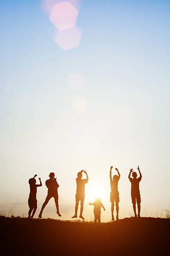 Silhouette of children jump gladness happy time