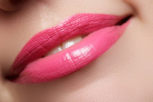 istock Perfect smile. Beautiful full pink lips. Pink lipstick 677170030