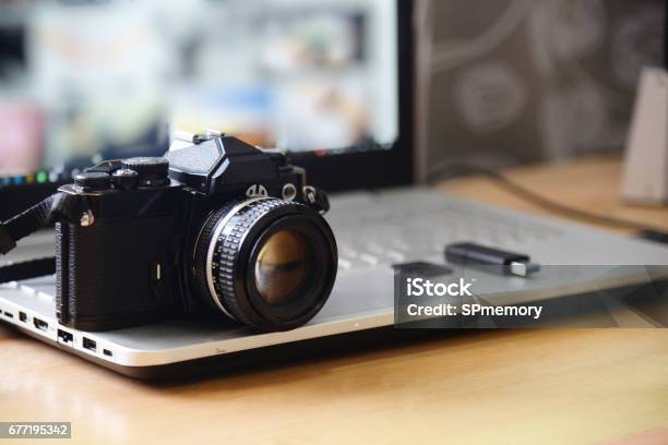 Digital Studio Photography Workstation Retro Film Dslr Camera Laptop Computer Screen And Flash Drive Memory Card Stock Photo - Download Image Now