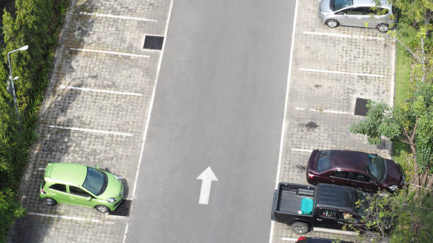 istock Car parking space and concrete road outdoor . 677218486