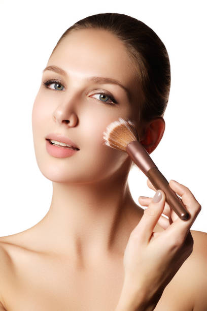istock Beauty model with makeup brush. Bright make-up for brunette woma 677239794