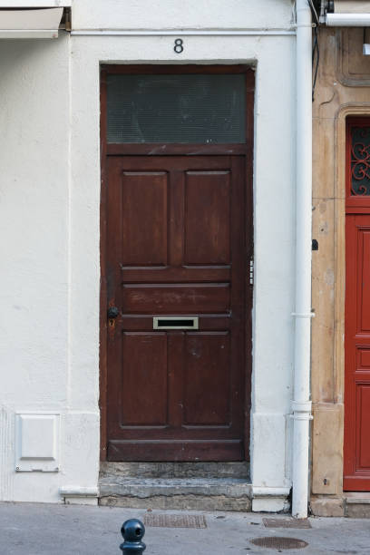 istock front doors in a historical city in central france 677253112