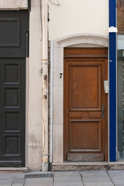 istock front doors in a historical city in central france 677254200