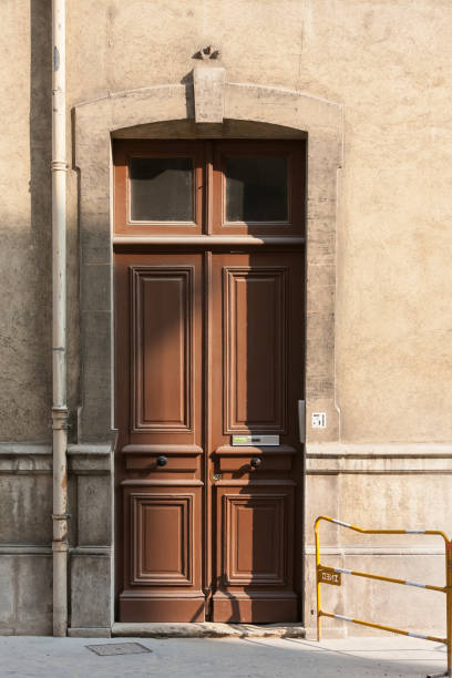 istock front doors in a historical city in central france 677255512