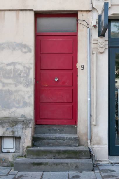 istock front doors in a historical city in central france 677256132