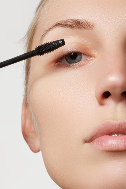 istock Mascara applying close-up, long lashes. Eyelashes extensions 677263324
