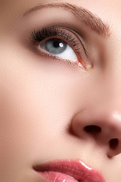 istock Macro shot of woman's beautiful eye with long eyelashes 677264348