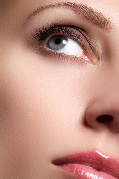 istock Macro shot of woman's beautiful eye with long eyelashes 677264368