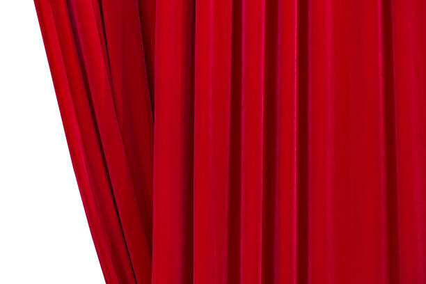istock Large picture of red curtains isolated on the white background 677292016