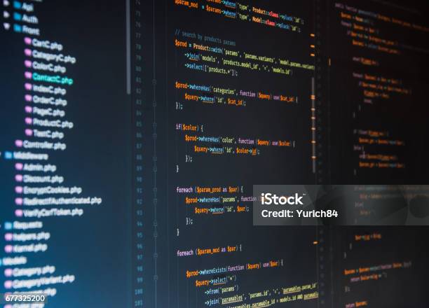 Php Code On Dark Background In Code Editor Stock Photo - Download Image Now - Broadcast Programming, Applying, Blue