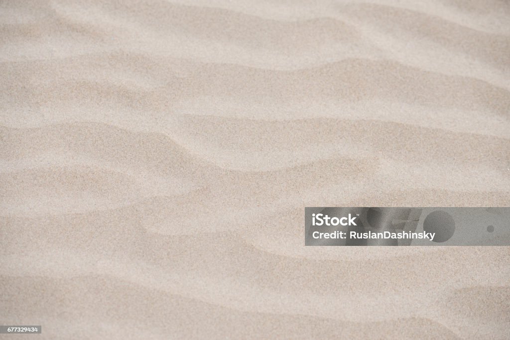 Sea sand pattern. Wavy sand texture background. Sand Stock Photo