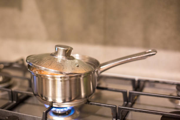 istock Eggs cooking on a gas stove 677376568