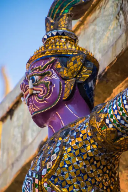 Photo of Mosaic colorful statue of buddhist guard