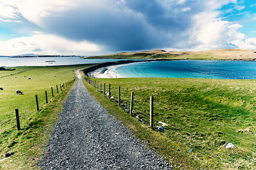 The arc of Bannamin Beach on West Burra, in the Shetland Islands of Scotland.