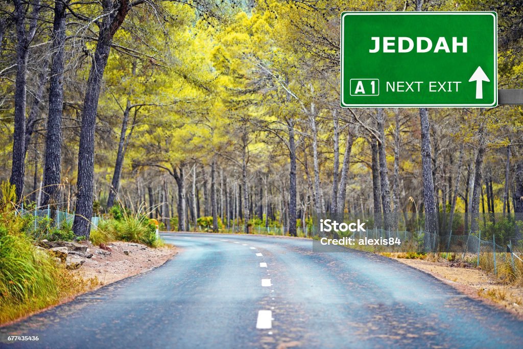 JEDDAH road sign against clear blue sky Avenue Stock Photo