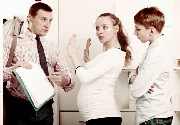 istock Mother and son struggling to pay bills 677442726