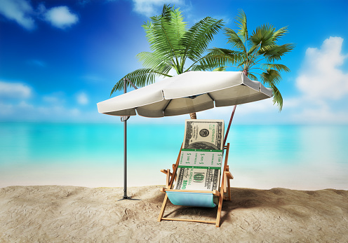 Concept of a credit vacation Concept travel One hundred dollar bills on a deckchair under an umbrella on the beach 3d render on blue