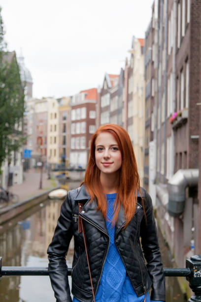 istock beautiful young woman exploring the town 677492766
