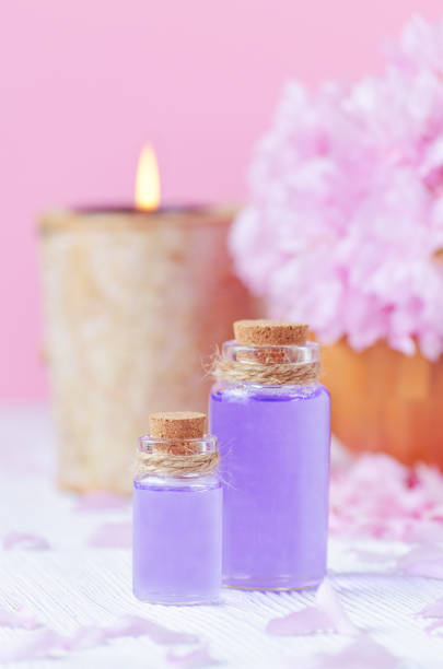 istock pink color spa concept, lavender oil, vertical 677502964