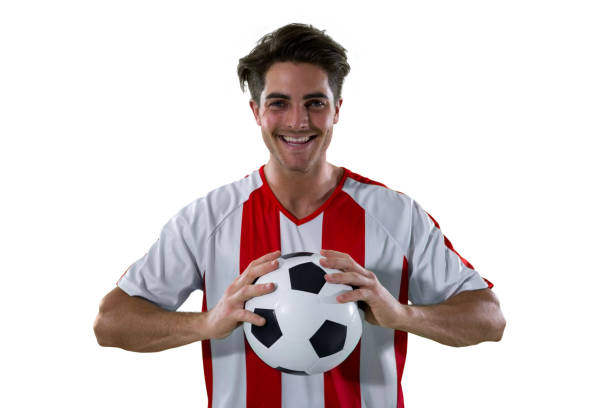 istock Football player holding football with both hands 677520830